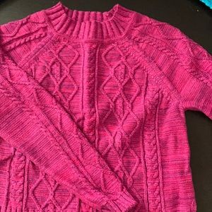 Cotton sweater. Mock neck. Side slit.